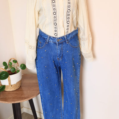 Jeans tachas