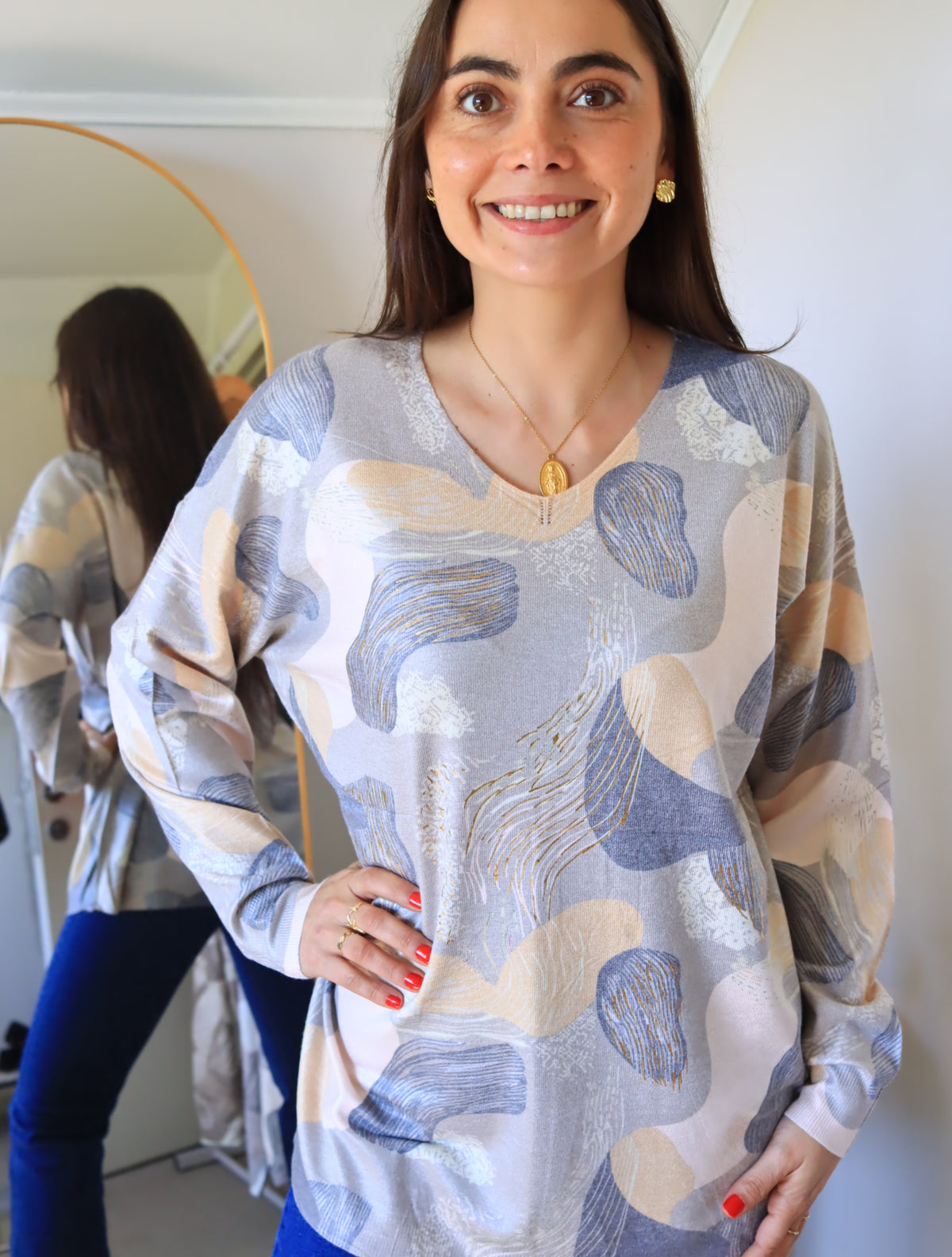 Sweater Lorena damasco con estampado en tonos durazno y azul