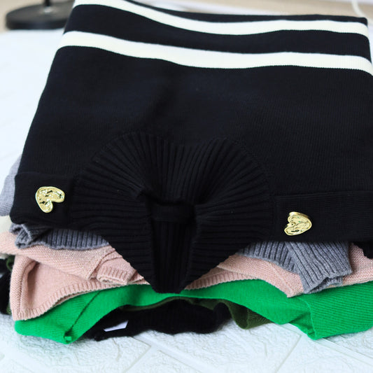 Gift Card ASIRI: sweaters doblados con botones de corazón dorado