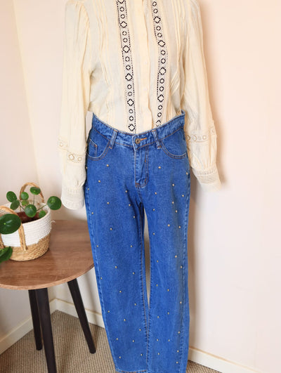 Jeans tachas